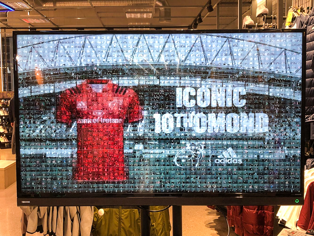Completed photo mosaic wall assembled from individual guest photographs โ corporate photo booth ideas