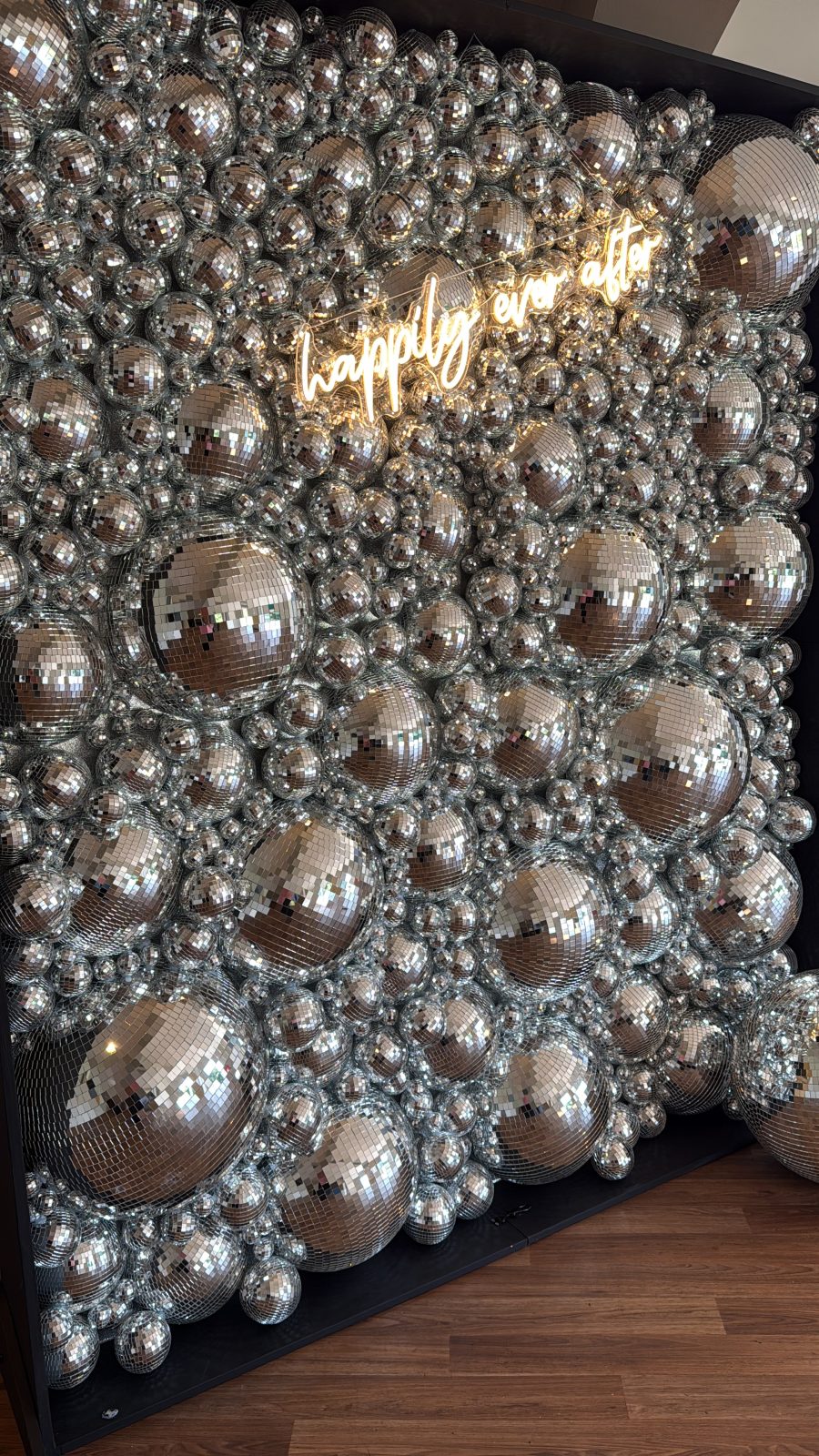 Close-up of a mirrored Disco Wall made from silver disco balls